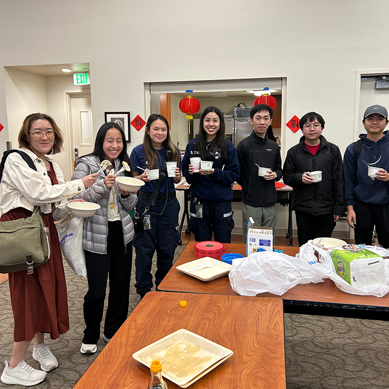 Students enjoy good food for Chinese New Year.