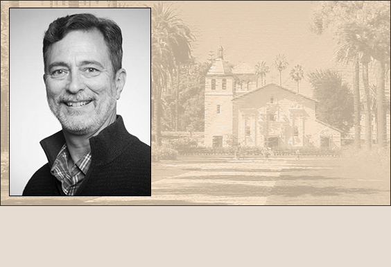 Portrait of a smiling person and a historic building in the background.