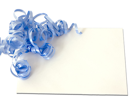 Envelope with a blue bow on top