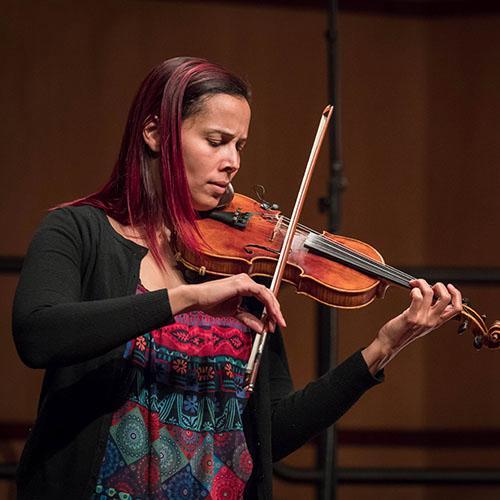 Rhiannon Giddens playing fiddle 