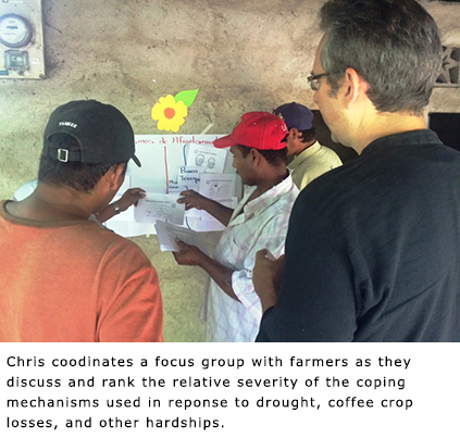Three people interacting near a wall with written text at the bottom.