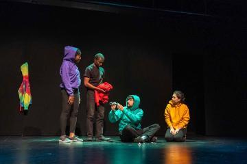 4 actors wearing hoodies - it does not define you