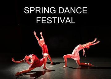 4 female dancers in red dresses dancing in a black box theatre