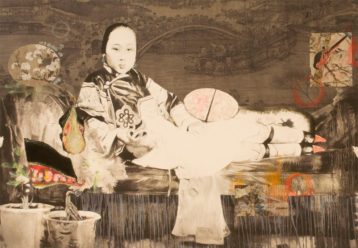 Young Chinese girl dressed in traditional clothing leaning back in repose.