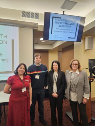 A group of people smiling at the camera