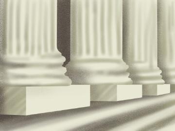 Columns outside of a courthouse. 