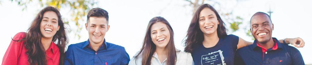 A smiling group of students.