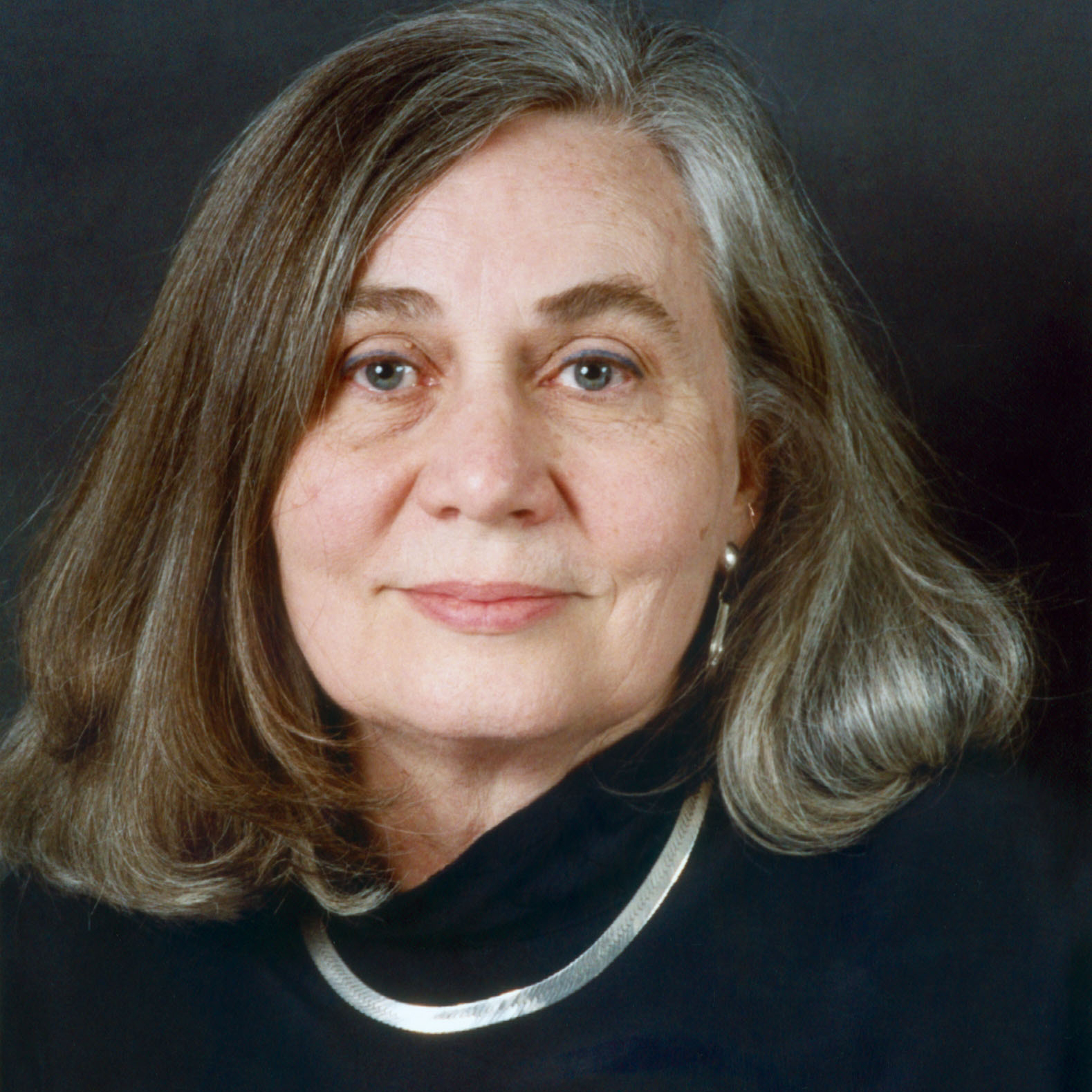 Alt text: Marilynne Robinson facing forward, wearing a dark top with a white collar. image link to story