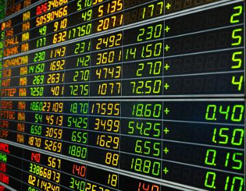 Stock market display with various financial data and numbers. image link to story