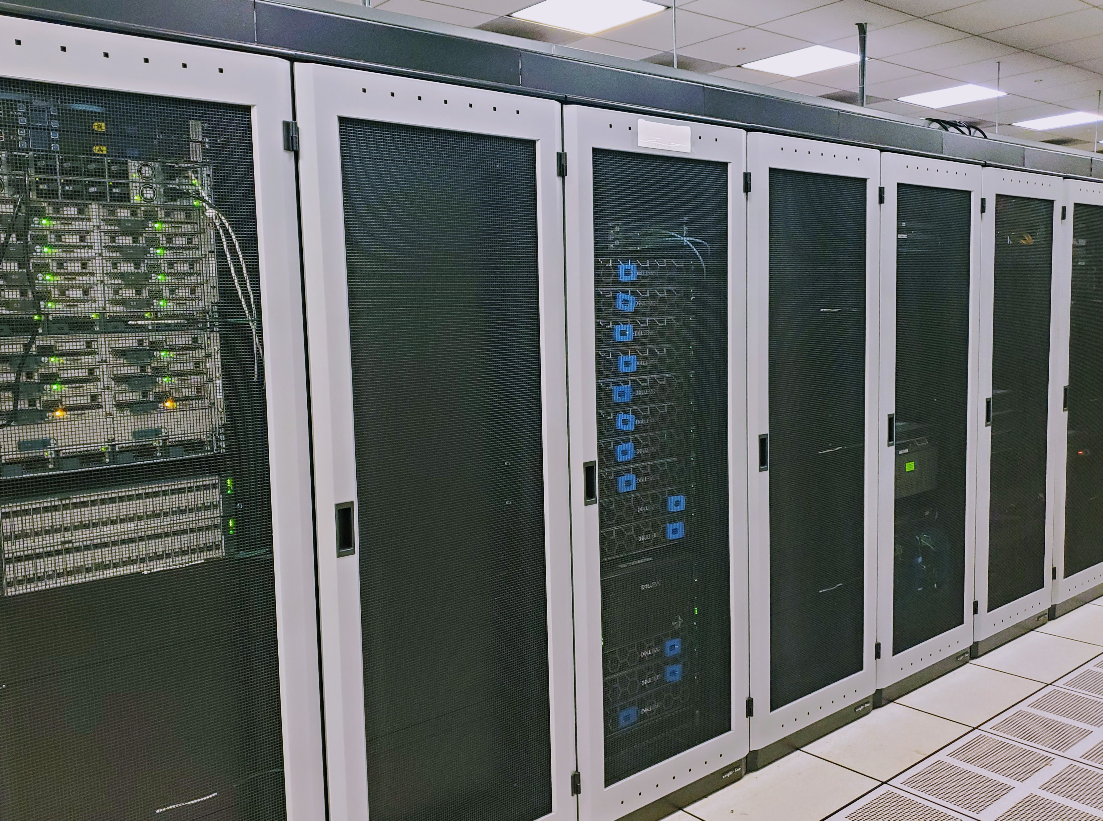 Alt text: Rows of server racks in a data center.