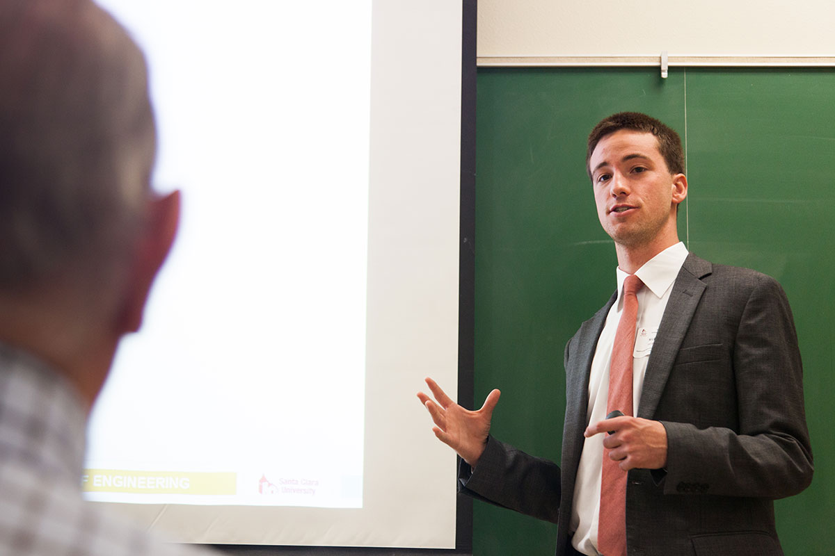A student presenting at the Senior Design Conference.