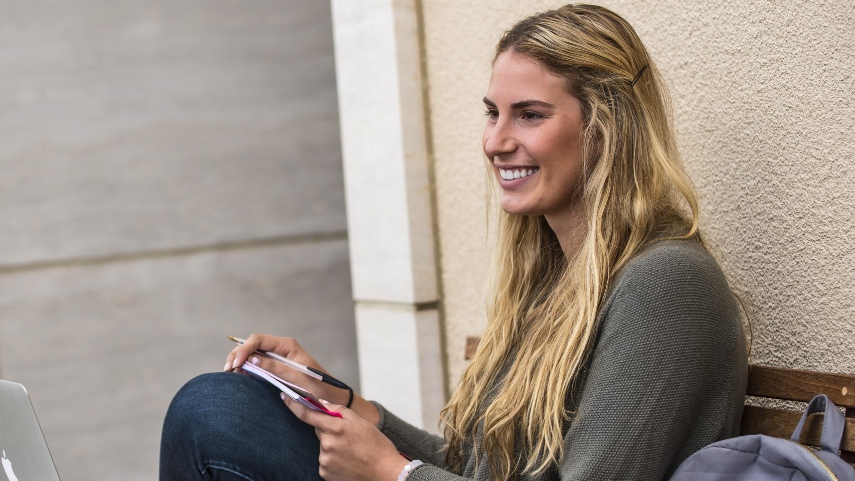 SCU Student sits in a classroom 