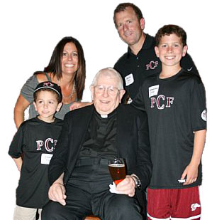 Father Coz with Family