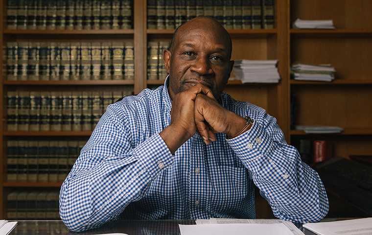 Calif Supreme Court Justice Martin Jenkins seated at a desk image link to story