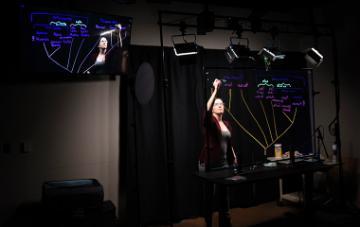 Tanya Chiykowski-Rathke working in the Learning Glass studio in the University Library. 