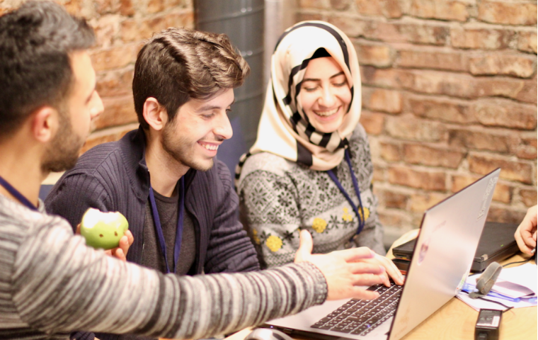 Three people who are part of Re-Coded, a participant in Miller Center SEM cohort image link to story