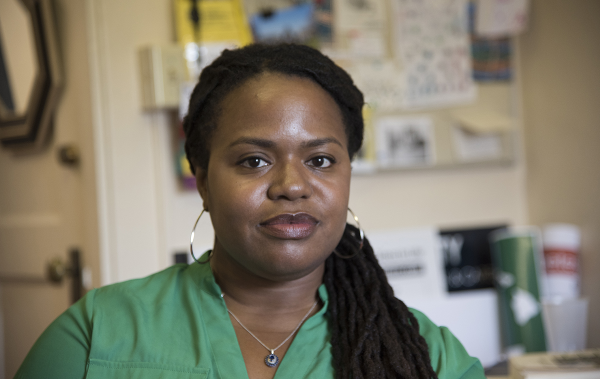 Robin Nelson sitting in her office