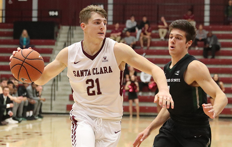 Henry Caruso '18 drives to the basket