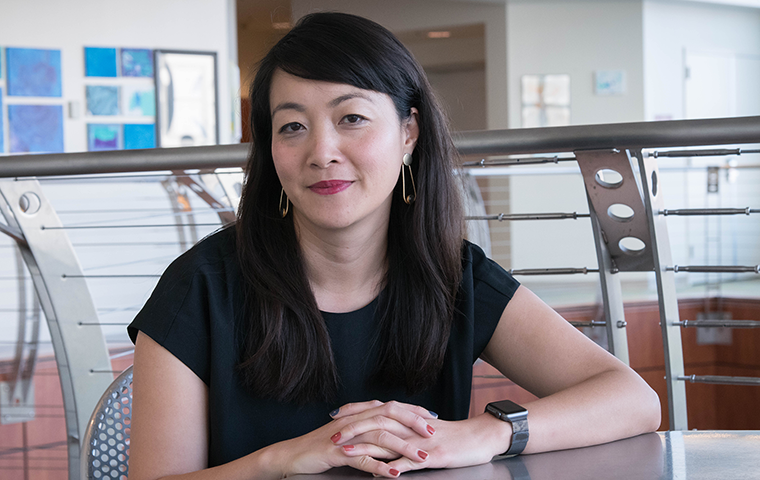 SCU Assistant Professor of Communication Chan Thai. Photo by Chuck Barry.