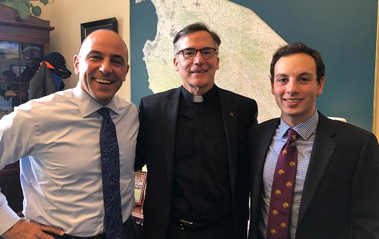 Kevin O’Brien, S.J. (center), U.S. Rep. Jimmy Panetta (left), and his nephew Michael Panetta ’19