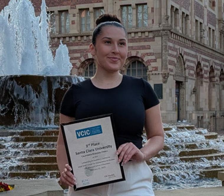 Isabella Guerrero holding 3rd place certificate for VCIC Competition 