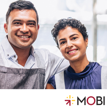 A smiling couple with aprons, accompanied by the logo and text