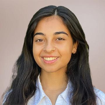 Woman smiling outdoors