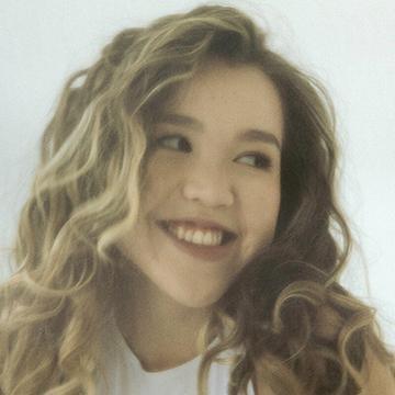 Woman looking to the side smiling