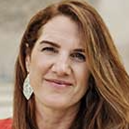 Woman with earrings and long hair, from 'Screen Shot 2022-10-19 at 3.04.04 PM'.