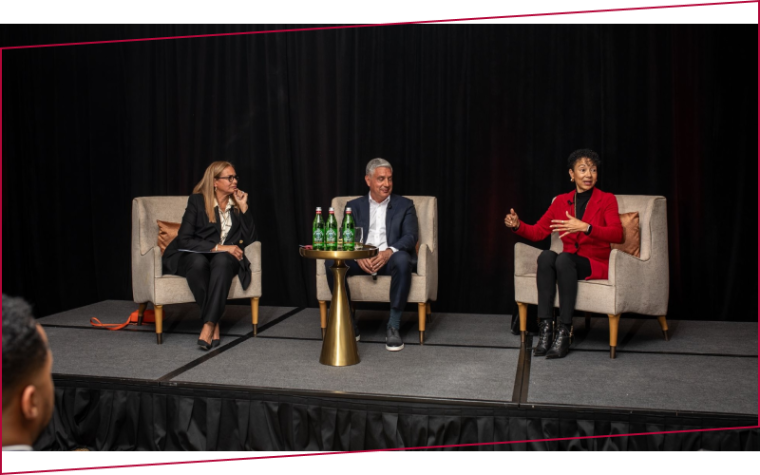 BCBR alumni on stage at a networking event in Dallas