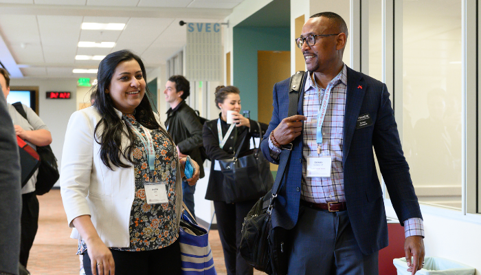 Woman and Man walking in Lucas Hall