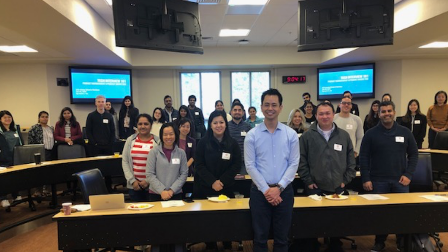 Lewis Lin in front classroom of students