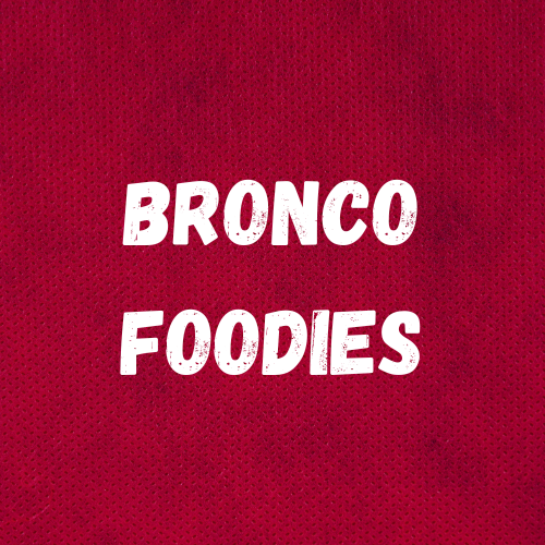 Red square with white letters that say 