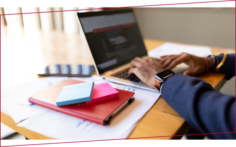 Leavey School of Business student working on laptop