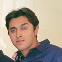 A person wearing a blue shirt.