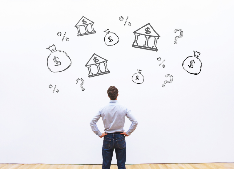 Photo of man viewing financing illustrations