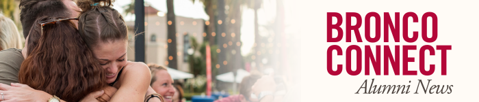 A group of friends hugging in front of the Santa Clara Mission Church. Text on the right reads 