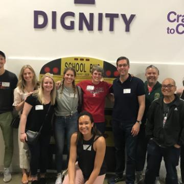 A group of people posing in front of 