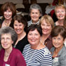 Group photo of women celebrating the 50th Anniversary of Women.