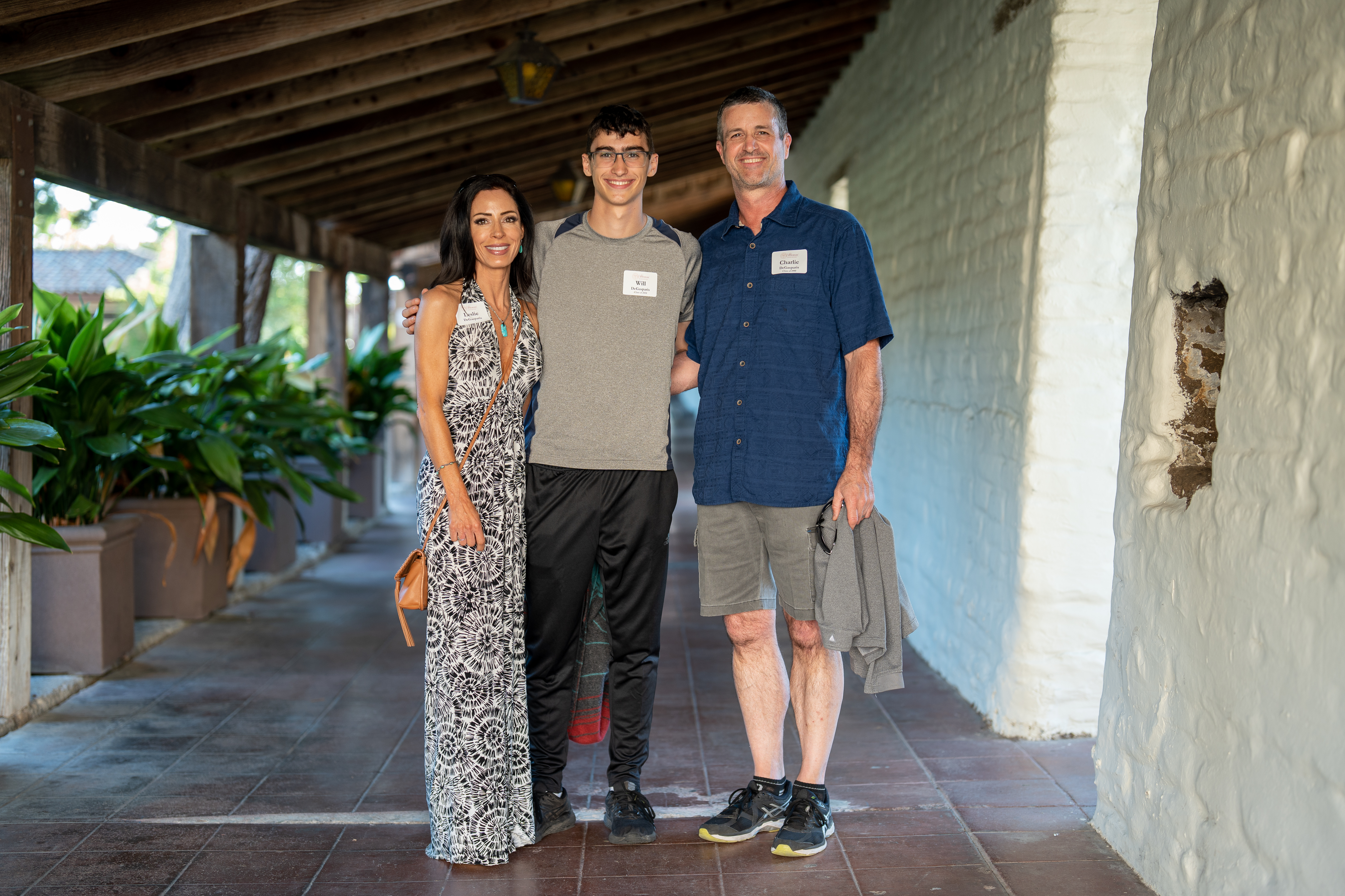 Three people posing at 