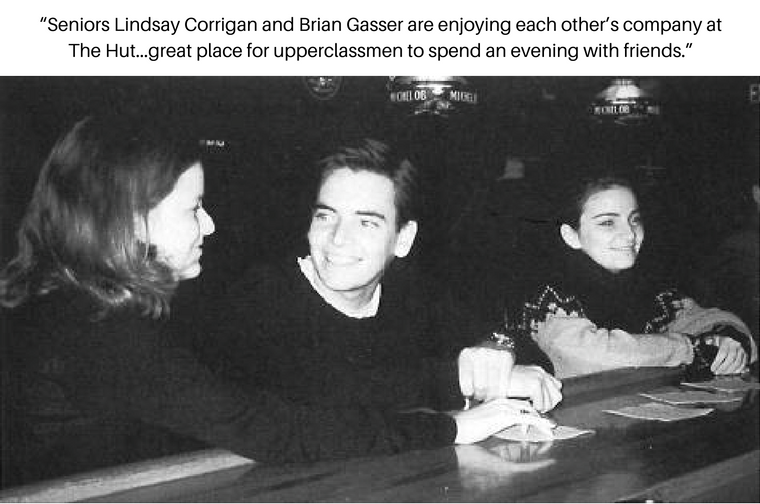 Three people at a table with drinks; caption above.