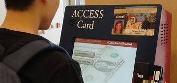 A person looking at a sign that reads