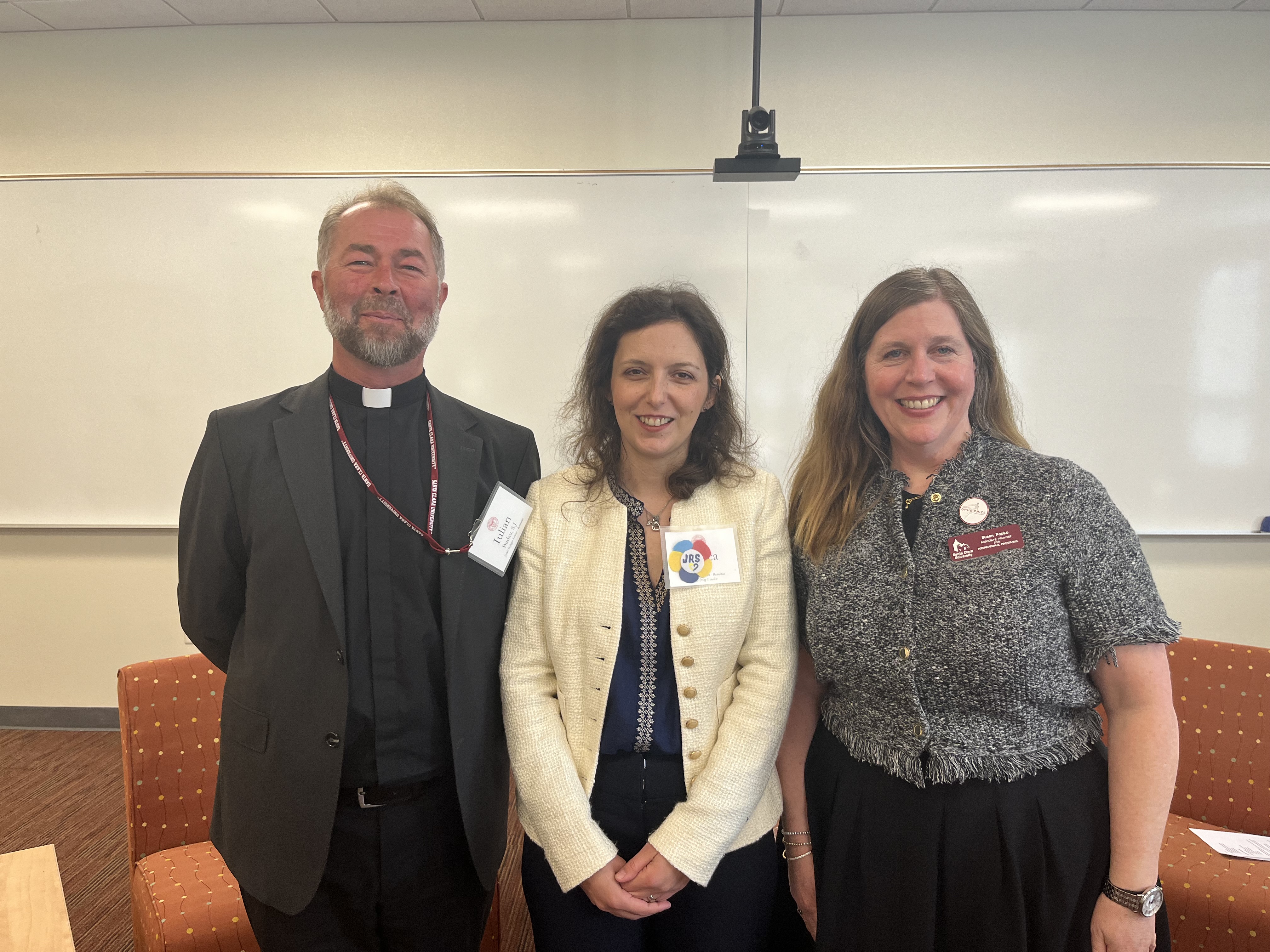 Decorative; Bianca Albu, Dr. Susan Popko, and Fr. Iulian Budau