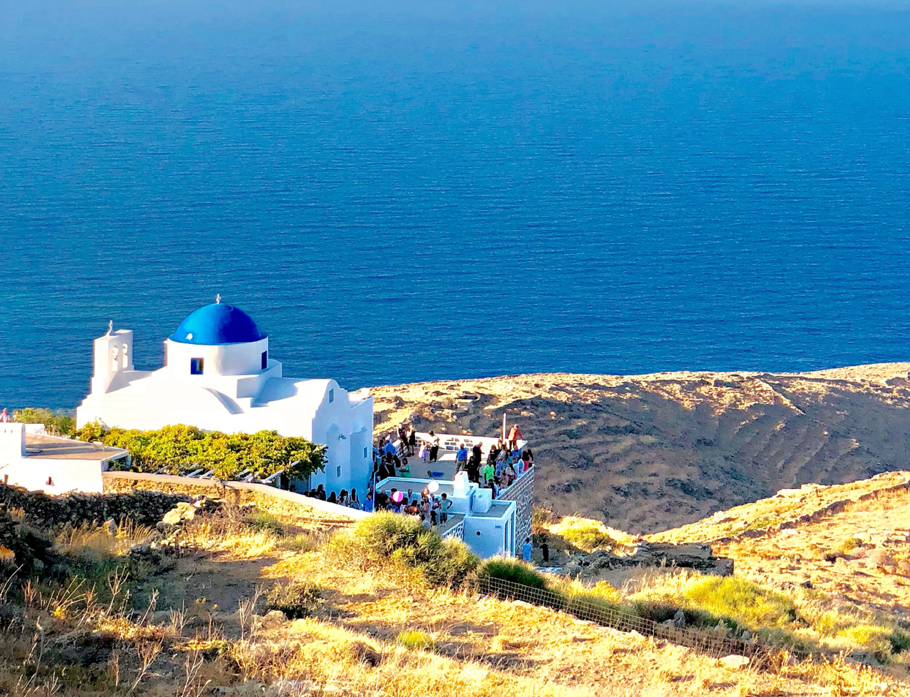 Decorative; Greek building with ocean in background 