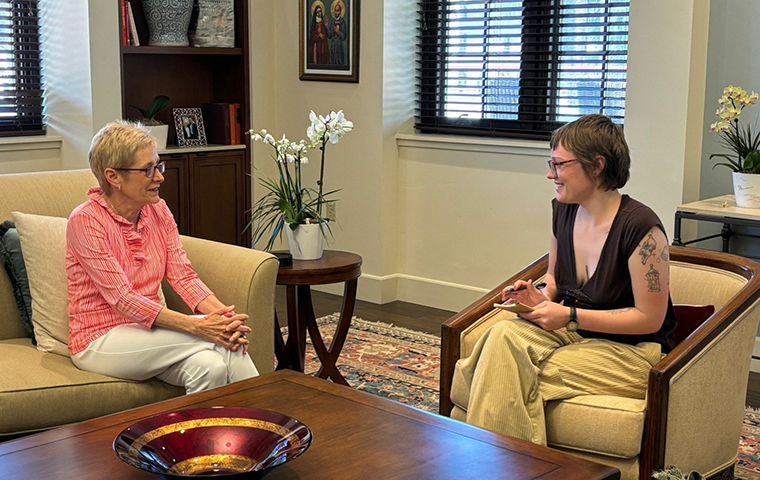 President Sullivan speaking to TSC Editor Rhiannon Briggs in President's Office