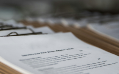 paper on clipboard with an assignment description 