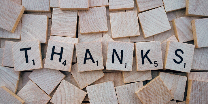 scrabble tiles spelling 'thanks'
