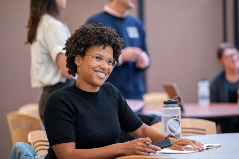 A student sitting at the desk 