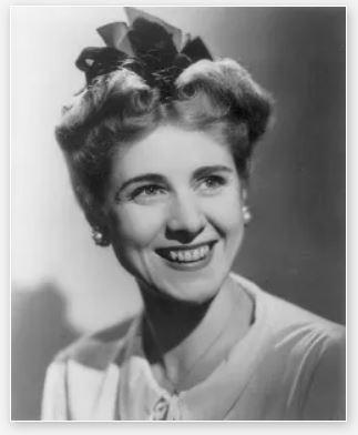 Black and white photograph of Clare Boothe Luce smiling.