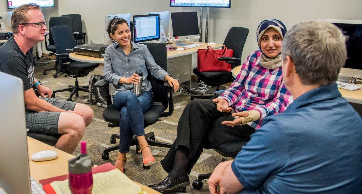 A group of faculty talking